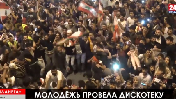 Планета+: митинг-дискотека в Ливане, сидячий протест каталонцев, пожар во дворце на Окинаве