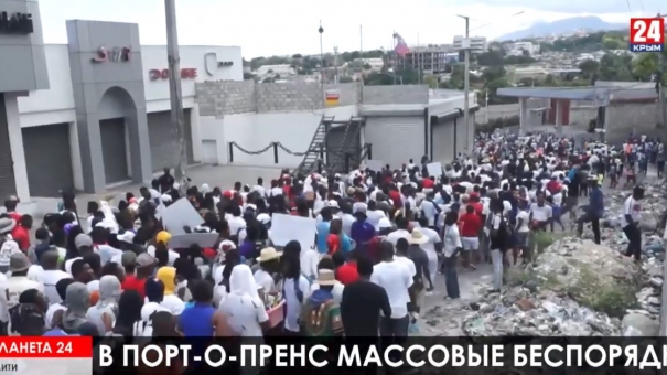 Планета 24: жертвы беспорядков на Гаити, выборы близко в Канаде, новая святая из Бразилии